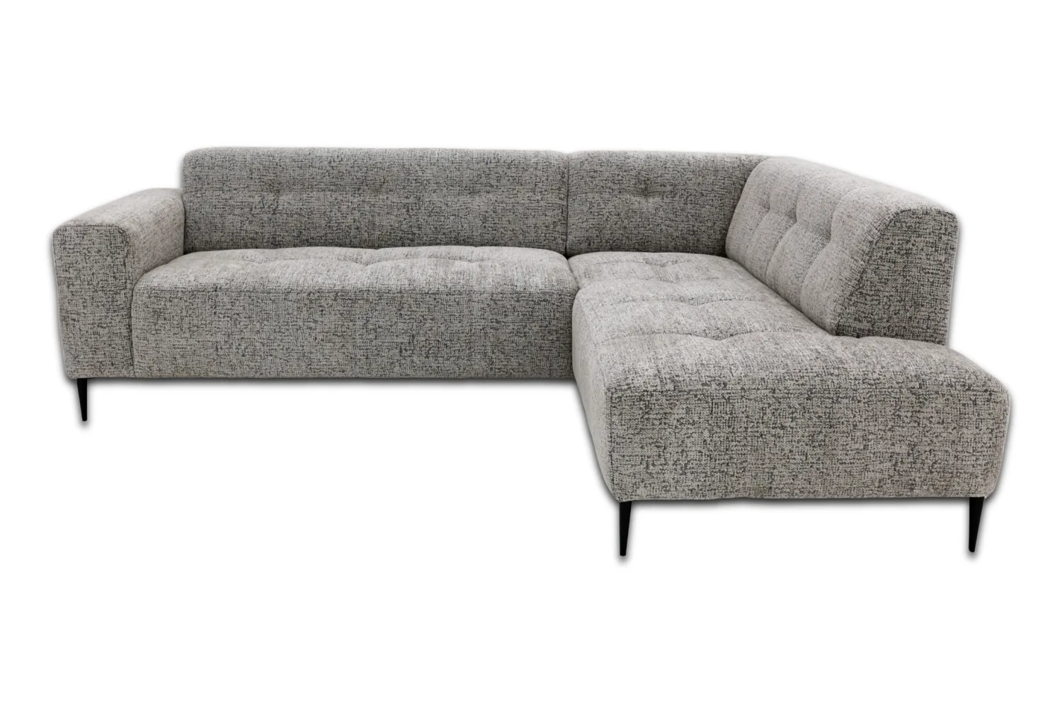 Hoekbank Bovino in een sfeervolle woonkamer met houten vloer en een salontafel - Mokana Furniture - Antraciet vs rechts