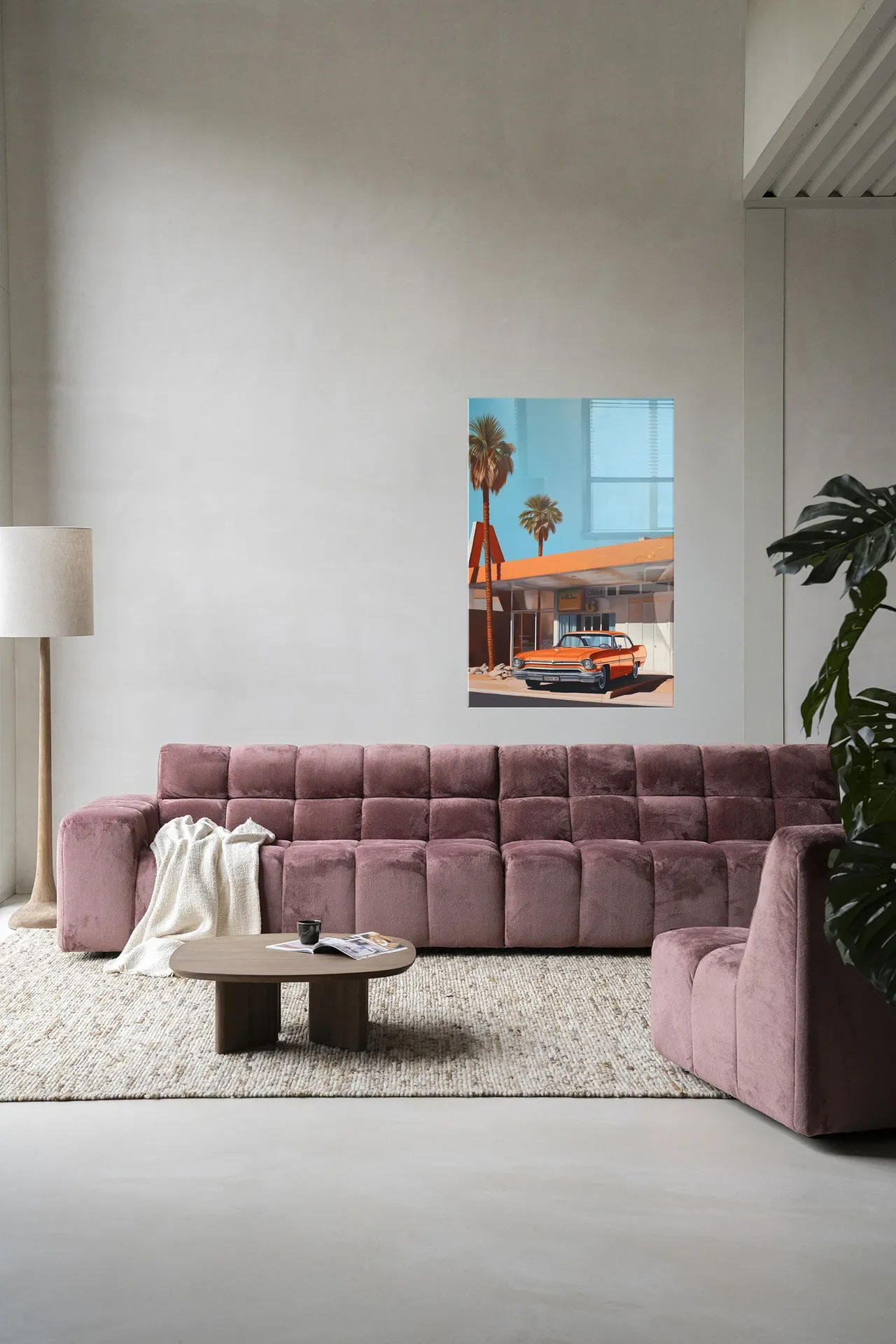 Wandteppich Sonny - Urban Cotton in einem modernen Wohnzimmer über einem rosa Sofa