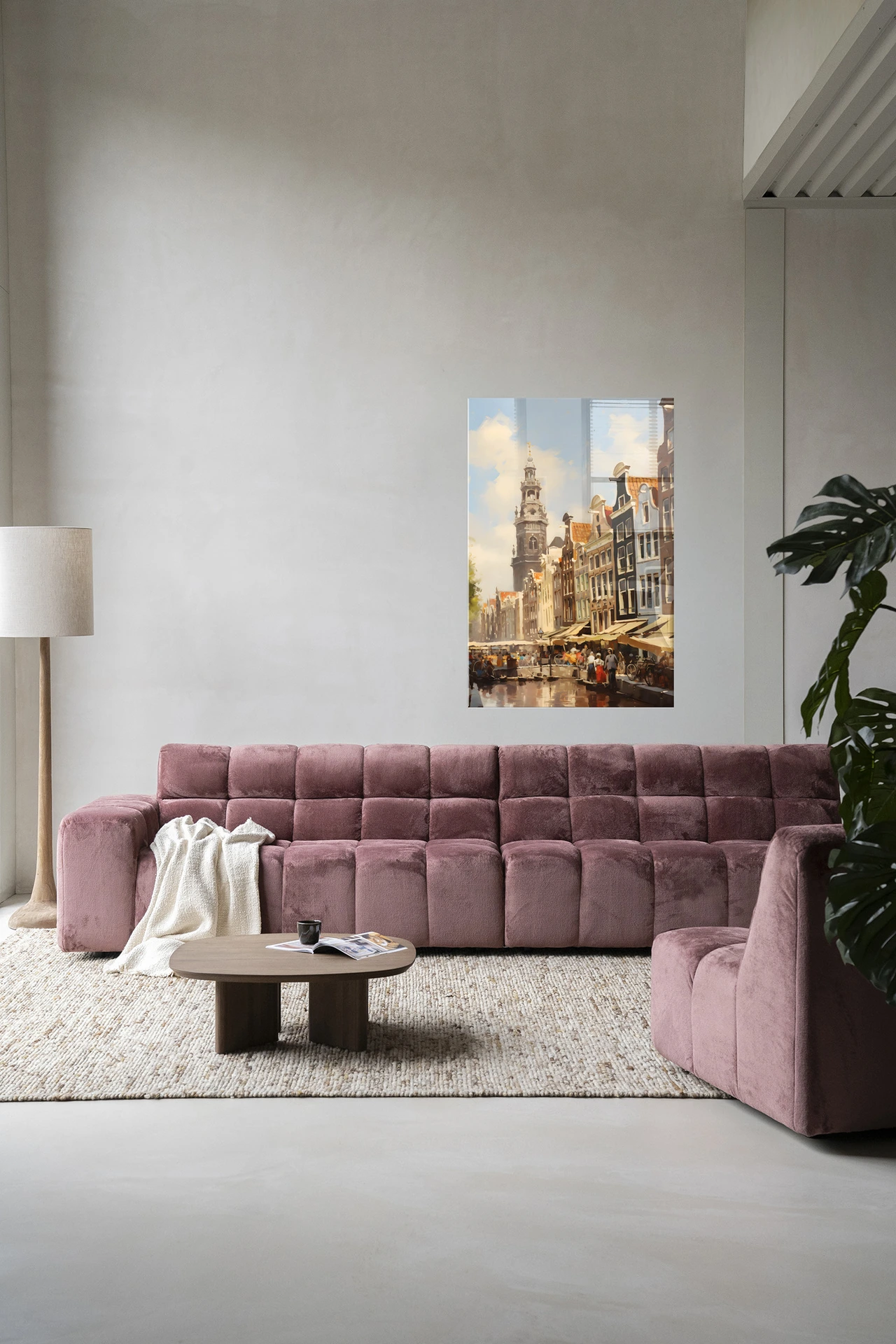 Wandkleed Amsterdam - Urban Cotton hangt boven een roze bank in een moderne woonkamer