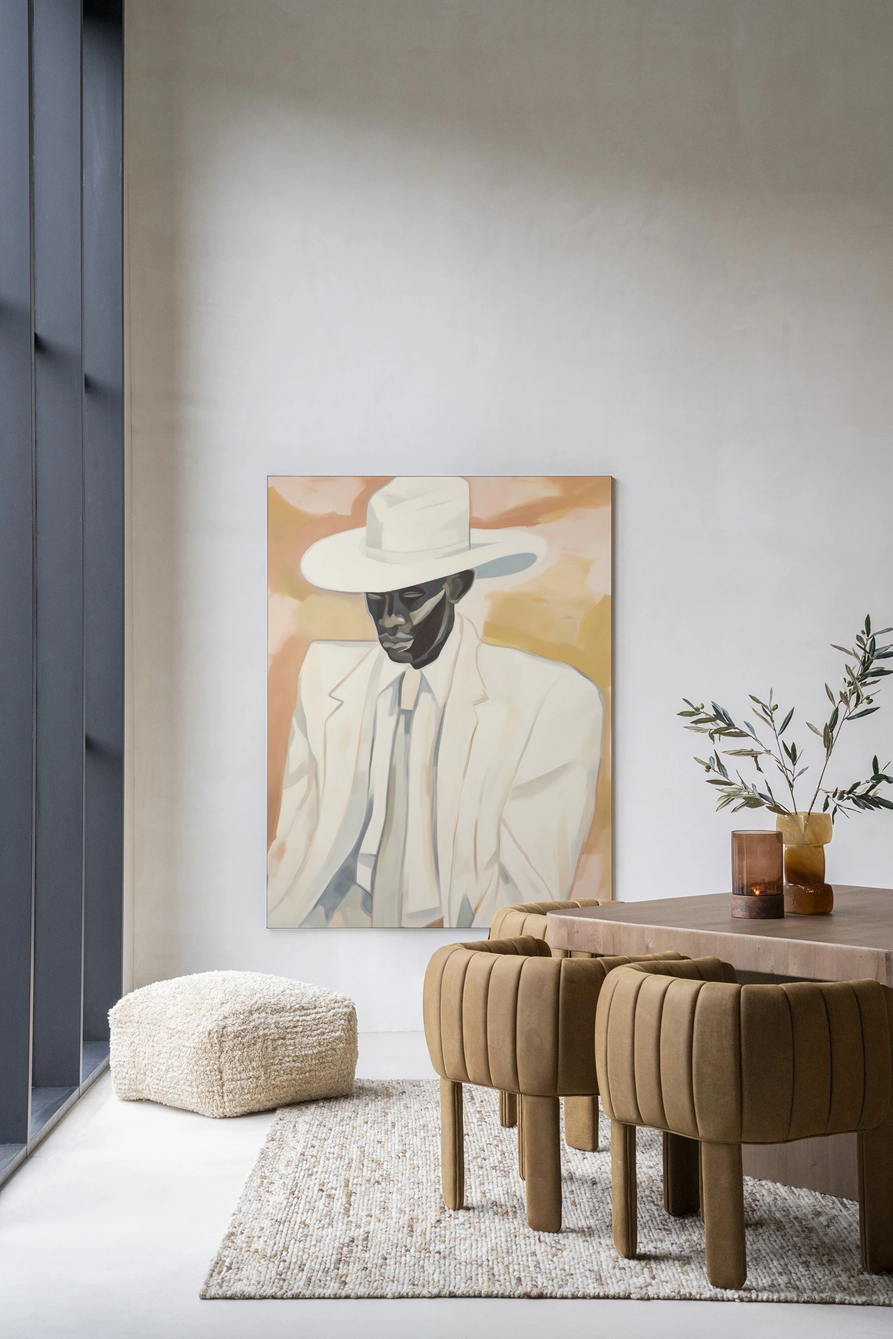 Wandkleed Dusty Don - Urban Cotton hangend aan een lichte muur in een modern interieur