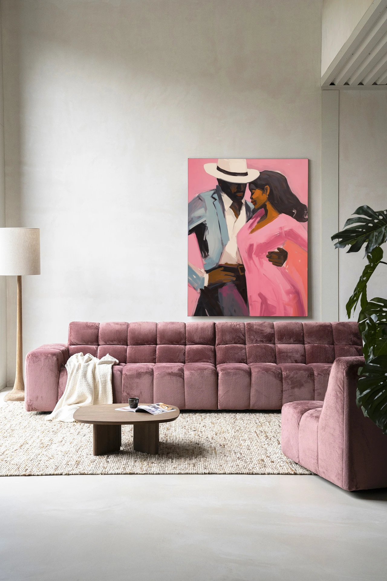 Wandkleed Cha Cha Cha - Urban Cotton boven een roze bank in een woonkamer