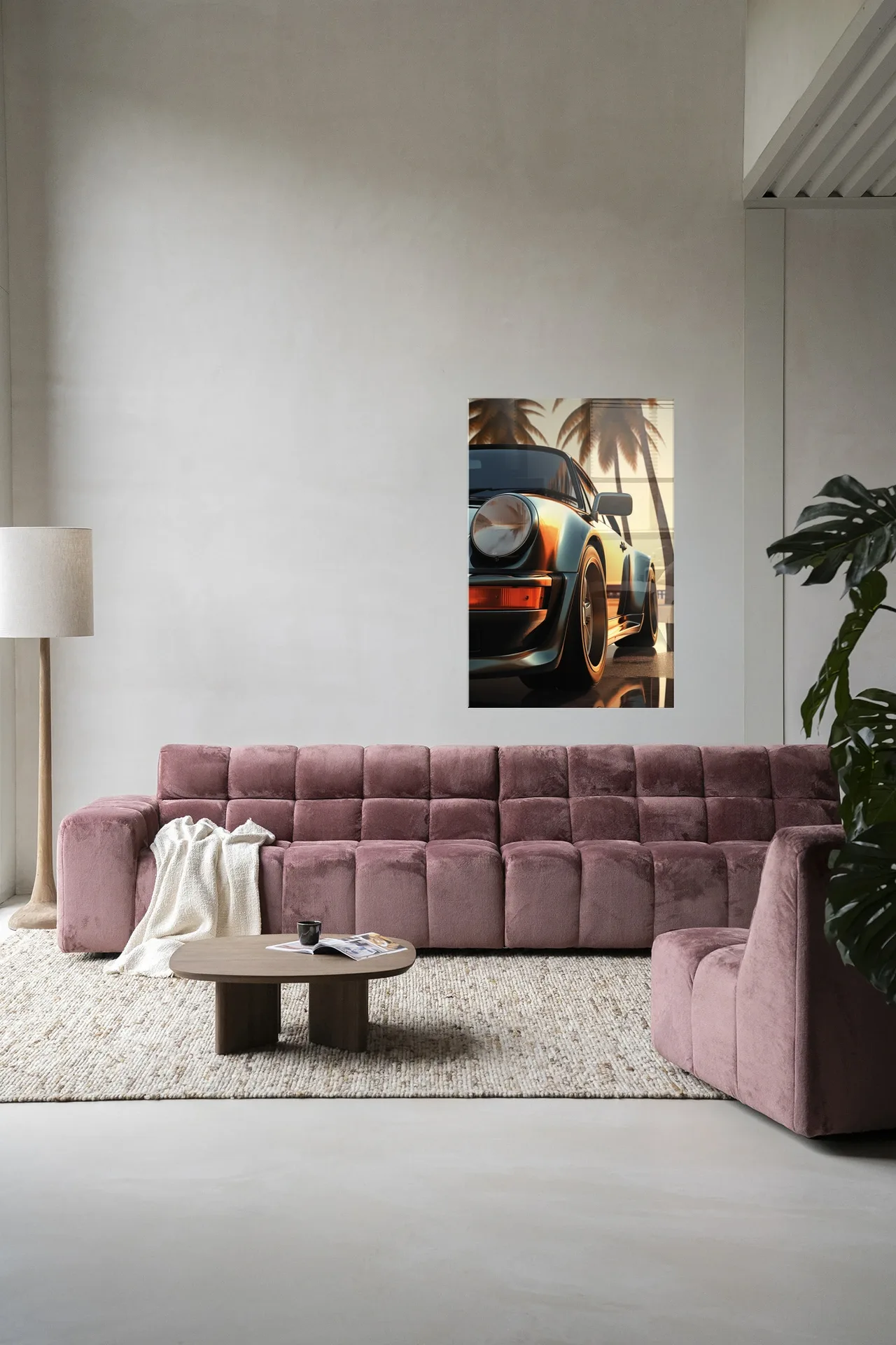 Wandkleed Miami Style - Urban Cotton hangend boven een roze bank in een moderne woonkamer