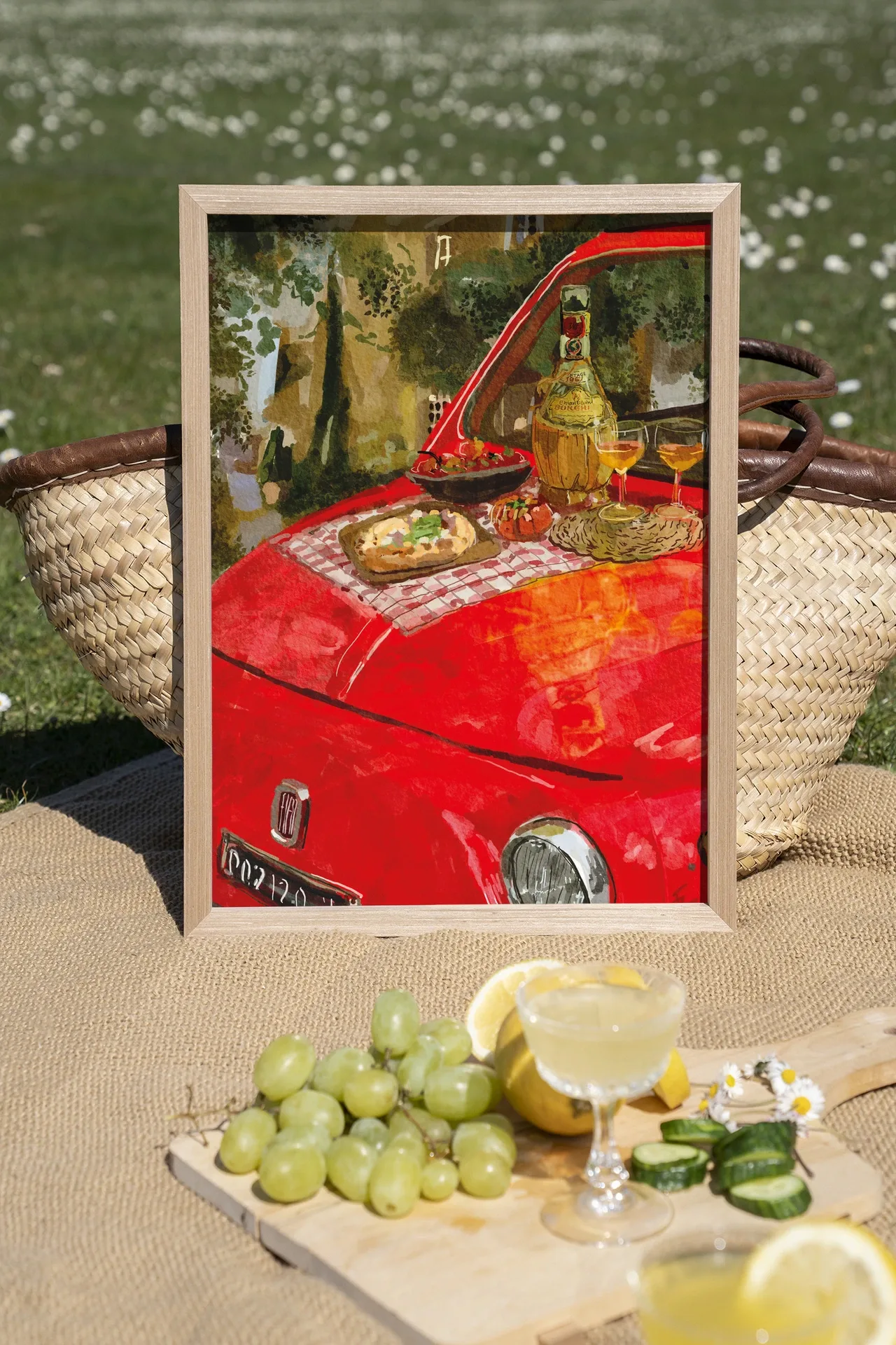 Wandteppich Meranda - Urban Cotton in einem Holzrahmen, stehend im Gras mit einem Picknick