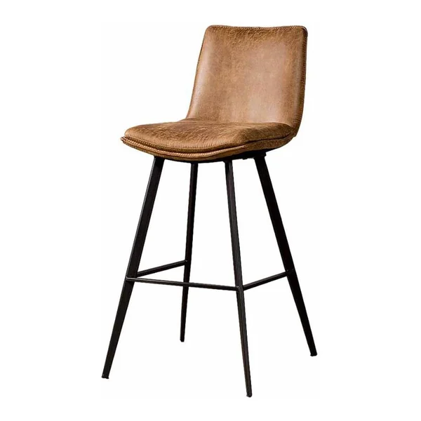 Der Pamplona Barhocker - fabric Antracite in einer industriellen Umgebung mit Holzdetails und weiteren Möbeln - Tower Living - Cognac
