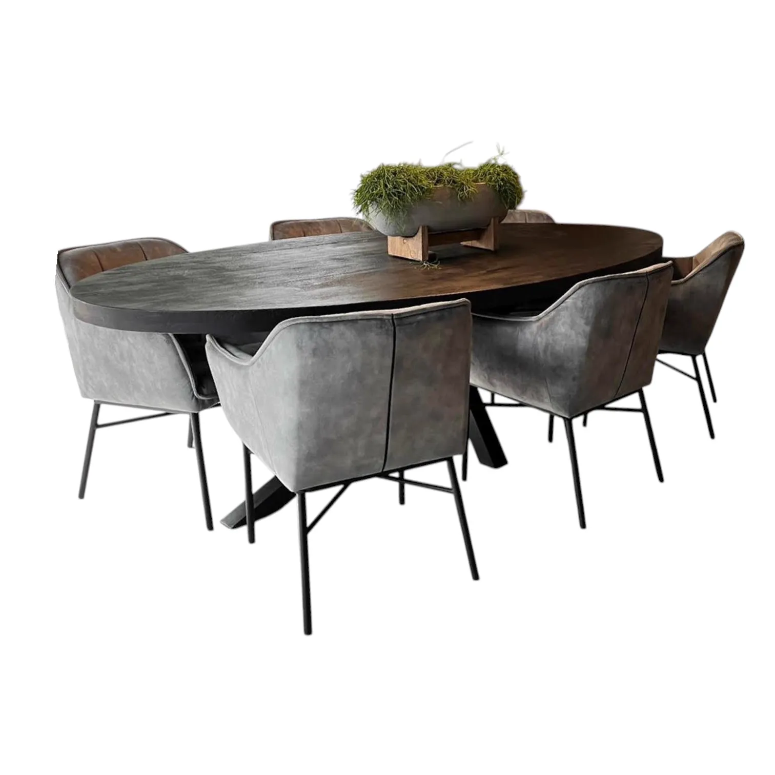 Zwarte ovale eettafel met zes gestoffeerde stoelen op een witte achtergrond, vanuit een laag standpunt gefotografeerd - Mokana Furniture