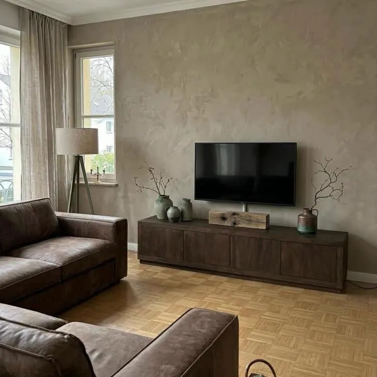 Starfurn TV-Schrank Brüssel Brown 200 cm in einem stimmungsvollen Wohnzimmer mit Sofa und Fernseher