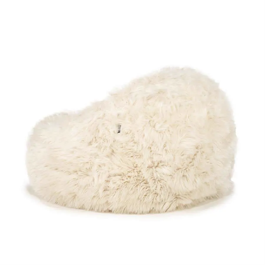 Der beige Snuzzle Sitzsack von By-Boo, von der Seite auf weißem Hintergrund gesehen