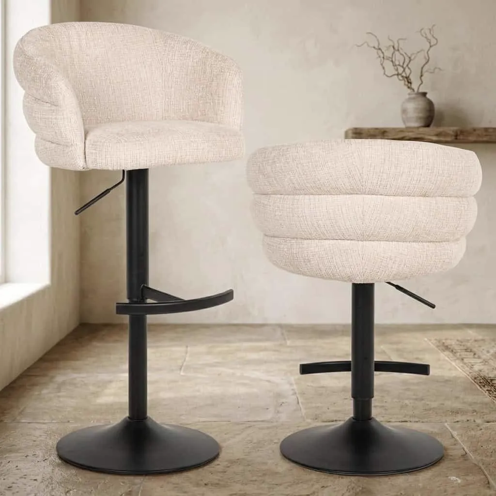Zwei Barhocker Nikki Niagara Beige Swivel Fire Retardant in einem hellen Wohnzimmer mit einem Holzregal an der Wand - Richmond Interiors