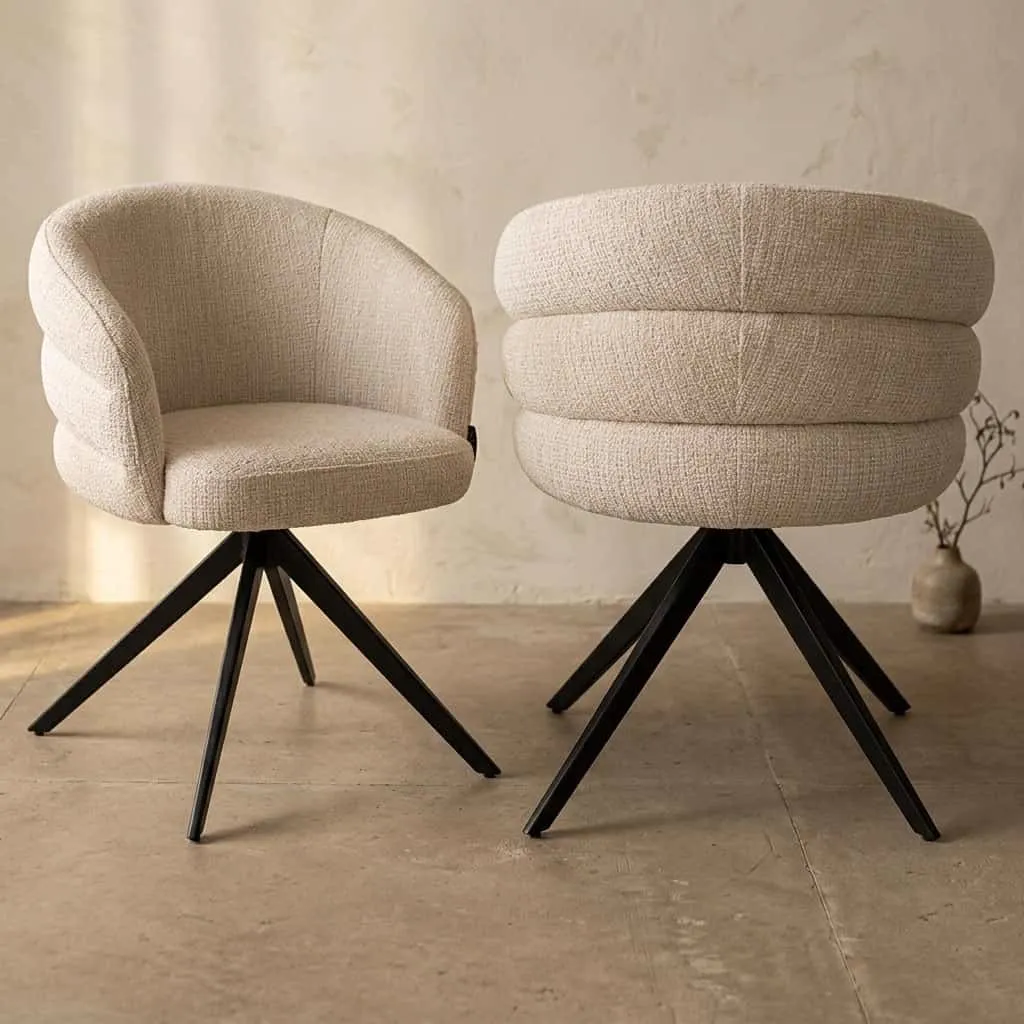 Zwei Esszimmerstühle Serenity Niagara Beige Swivel Fire Retardant in einem Studio, der rechte Stuhl von hinten gesehen - Richmond Interiors