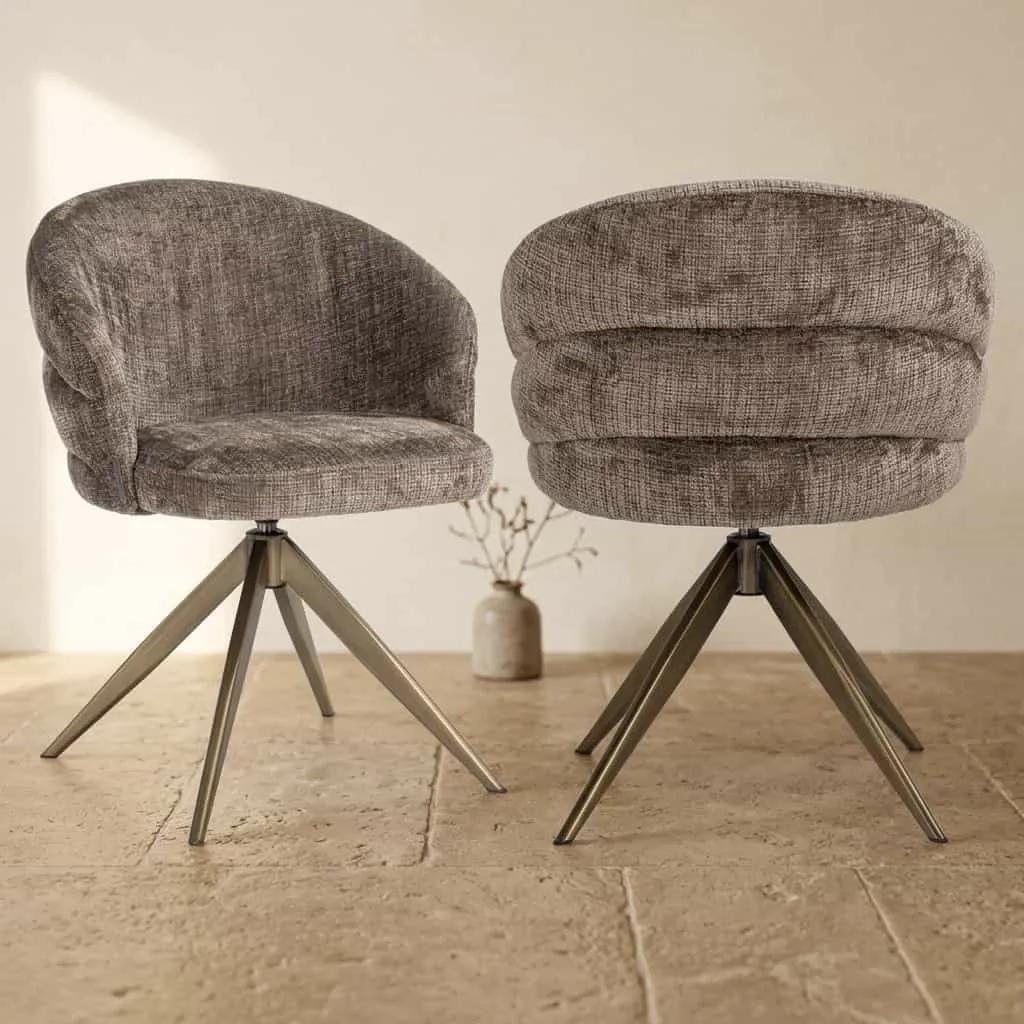 Twee Zendaya niagara stone swivel eetkamerstoelen in een studio, de rechter stoel van achteren gezien - Richmond Interiors